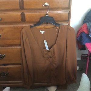 Cognac colored blouse with buttons on the front